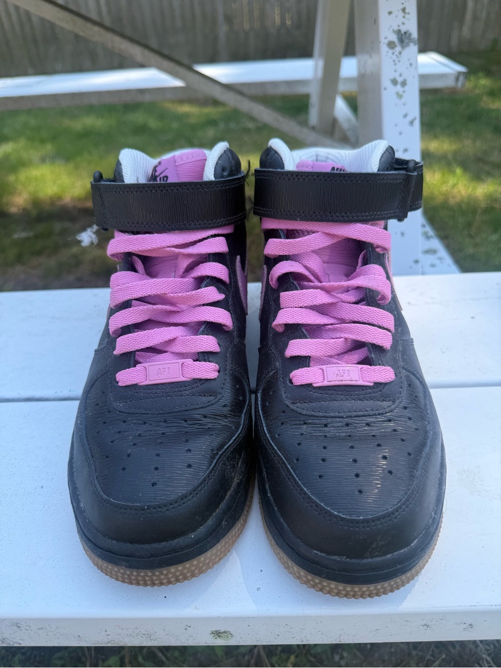 Nike Black Sneakers with Pink Accents